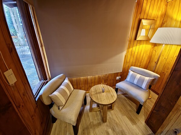 Romantic Loft, Partial Lake View | Living area | 43-inch Smart TV with digital channels - Cabañas El Remanso (Puerto Manzano)