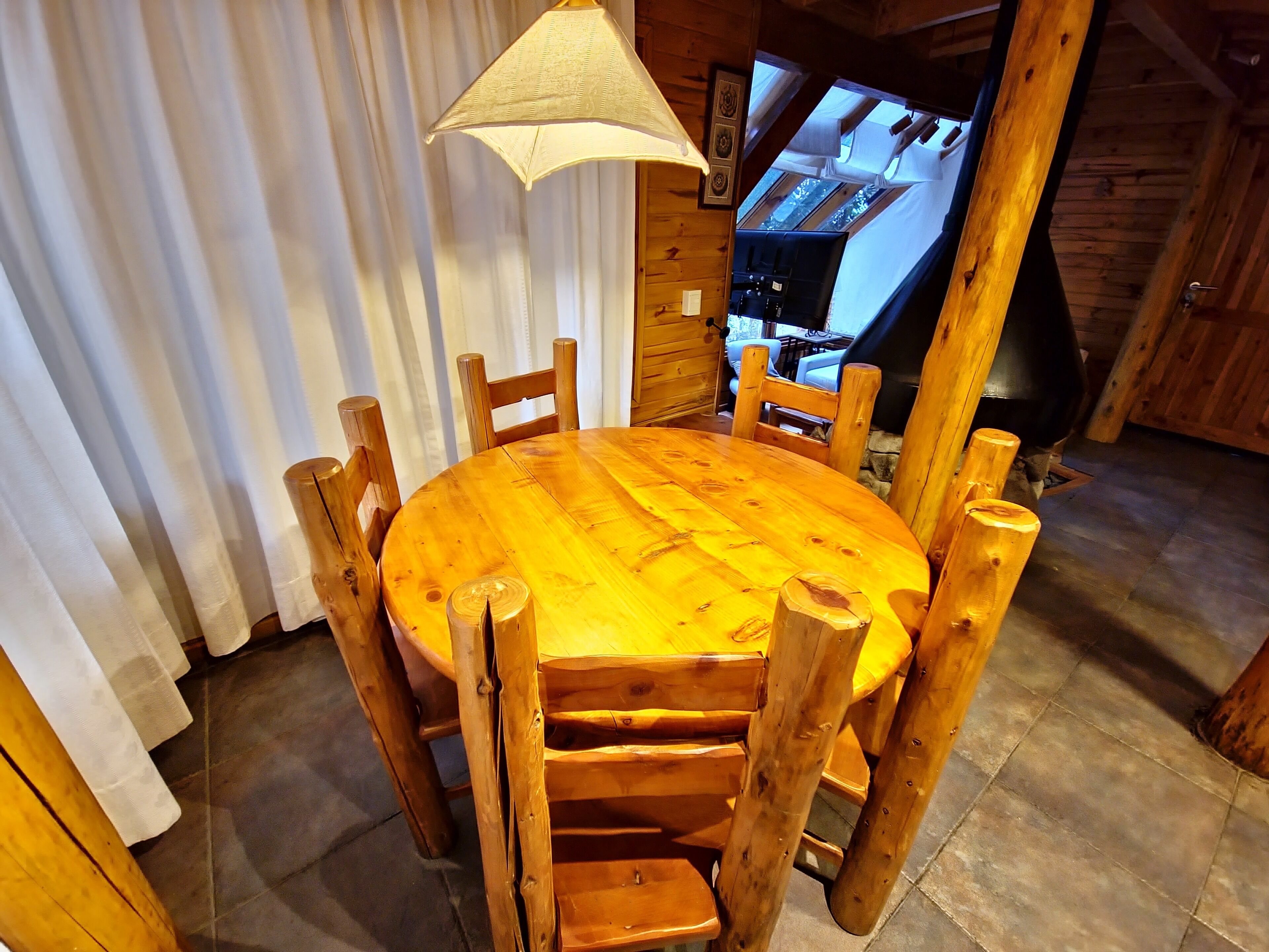 Panorama huisje, uitzicht op resort | Dineerruimte