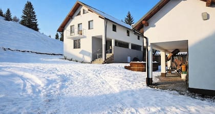 Tranquil 4-bedroom cabin in charming Colibita perfect for a relaxing getaway.