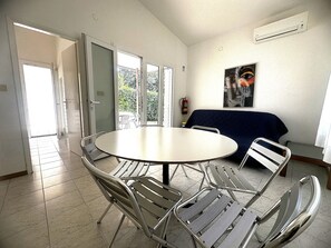 Villa, 3 Bedrooms, Patio, Garden View | Dining room - Quiet Garden Villa Just 100mt From the Beach (San Michele al Tagliamento)