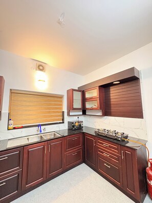 Private kitchen - Lulu Mall Side Modern 2 BR  Ideal for Long & Short Stay (Kochi)
