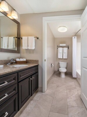 Hair dryer, towels, soap, shampoo