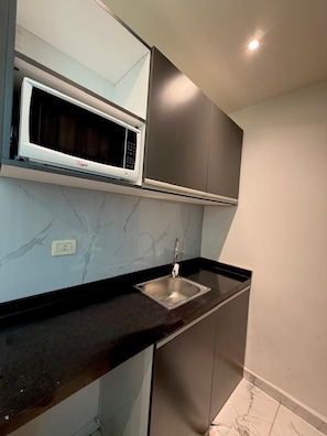Suite Junior, vue ville | Coin cuisine privé