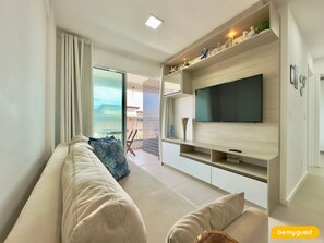 Appartamento Basic | Area soggiorno | TV a schermo piatto