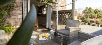 This converted barn with hot tub offers the perfect rural escape