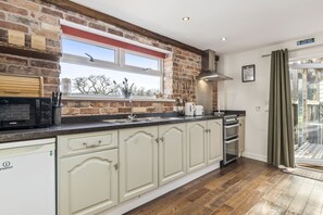 Fridge, microwave, oven, toaster - This converted barn with hot tub offers the perfect rural escape (St Clears (3.5 miles NW))