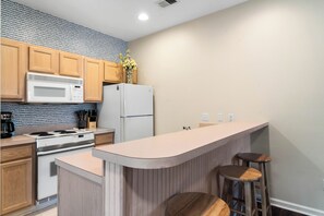 Private kitchen - Beach Town Resort first floor 1-bedroom condo in Sunset Beach (Sunset Beach)