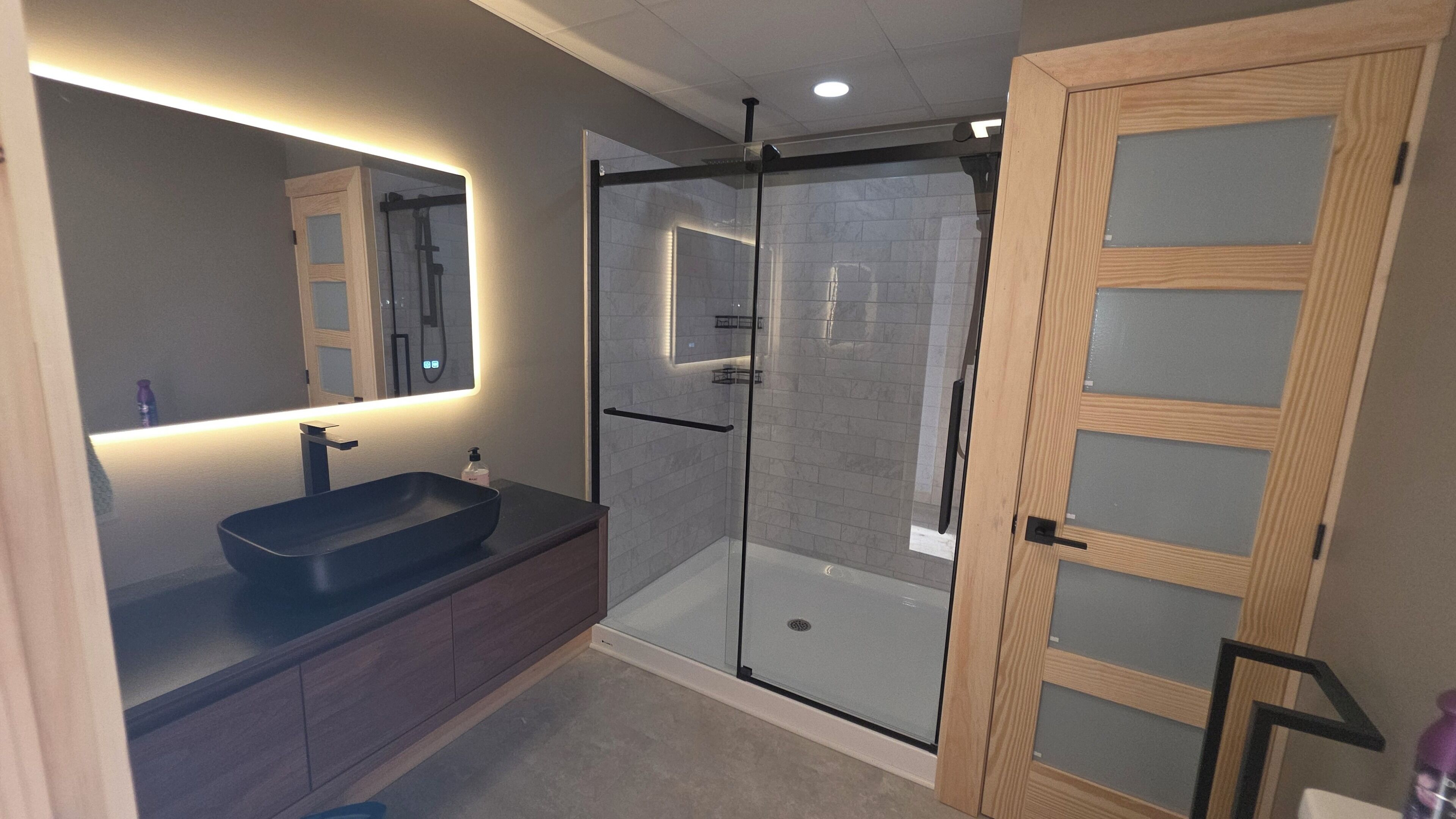 Shower, hair dryer, soap, toilet paper