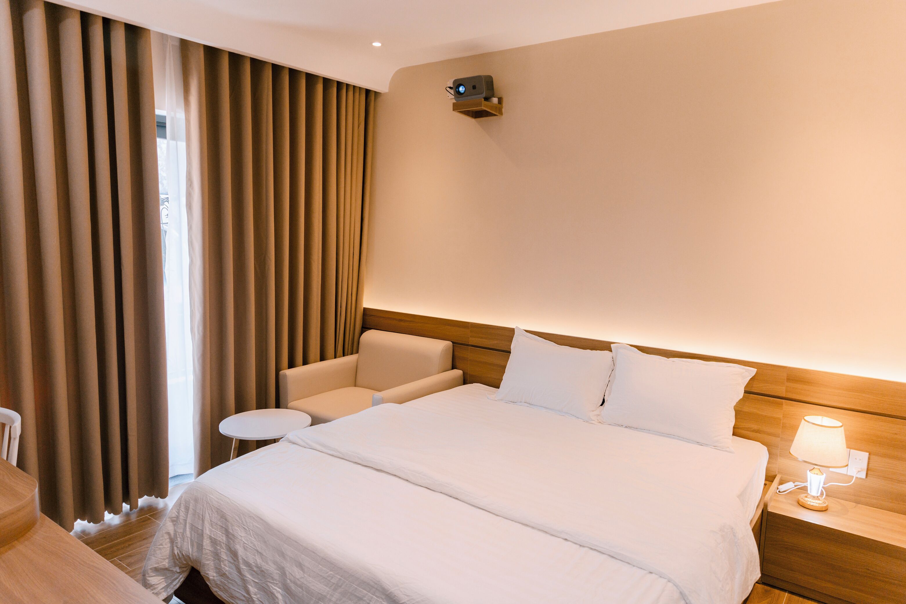 Economy Room | Desk, laptop workspace, blackout curtains, soundproofing