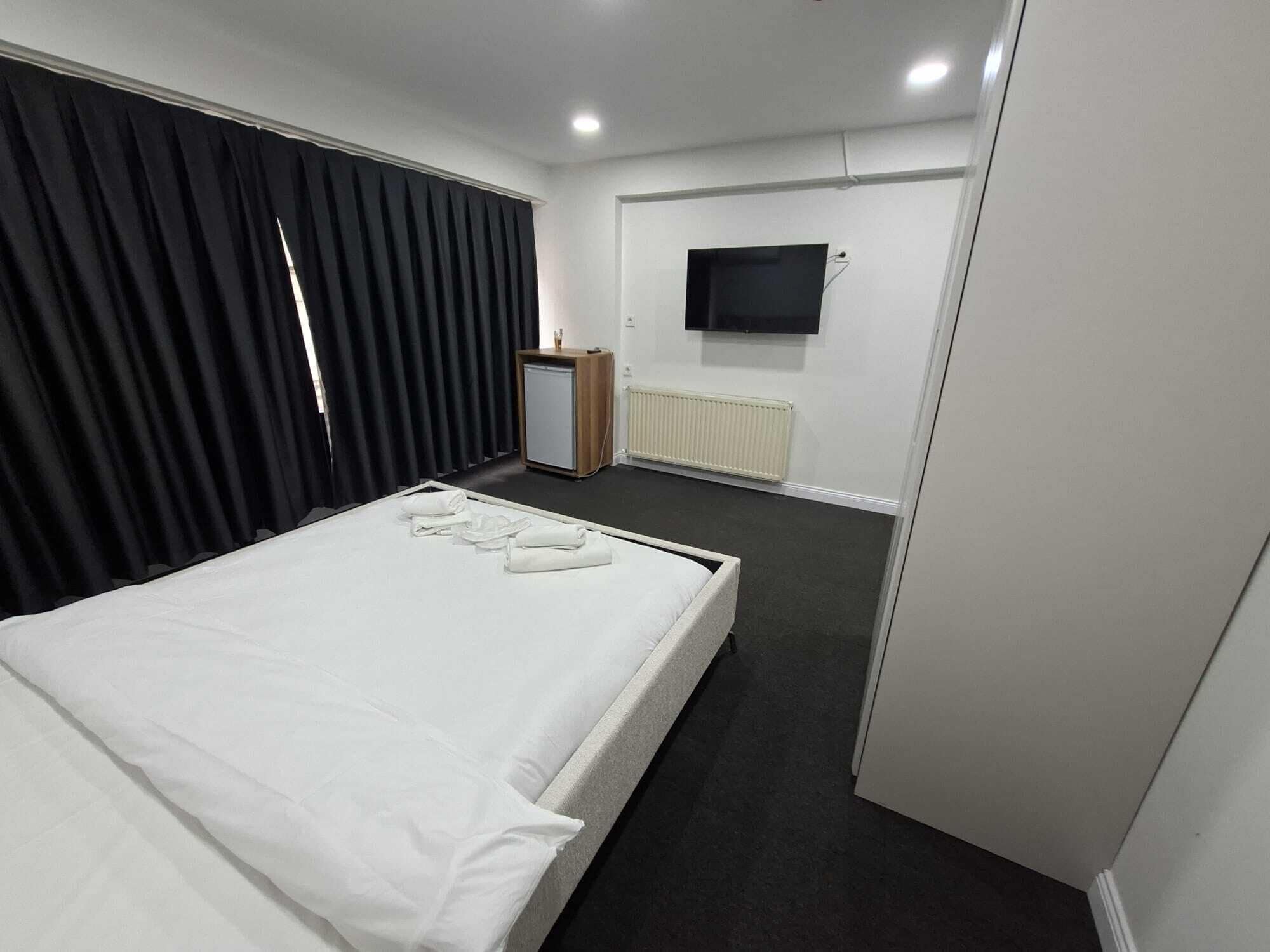 Deluxe Double Room, City View | Blackout drapes, soundproofing, iron/ironing board, free WiFi