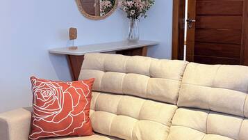 Comfort Apartment | Living area | 32-inch Smart TV with digital channels