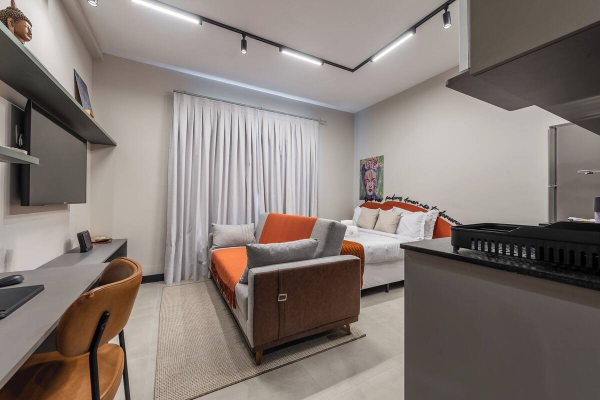 Design Apartment, 1 Double Bed with Sofa bed, Microwave, City View | Living area | 40-inch TV with digital channels, Netflix, streaming services