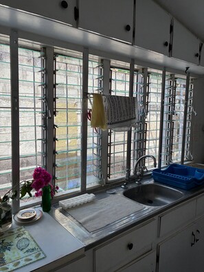 Private kitchen - Rustic retreat 1-bedroom apartment in pleasant Christ Church location (Christ Church)