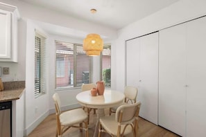 Dining nook with rattan pendant lights
