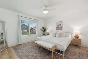 Bright guest bedroom with cozy neutral tones
