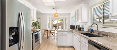 Bright open kitchen with bar seating