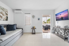 Deluxe Apartment | Living area | 32-inch flat-screen TV with digital channels - 63 Bay View by Otium (Catano)