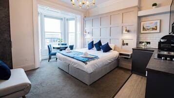 1 dormitorio, tabla de planchar con plancha, Internet y ropa de cama