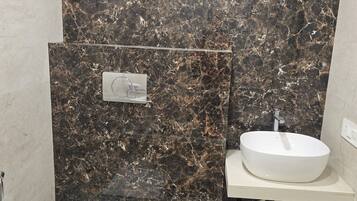 Bidet, towels, soap, shampoo