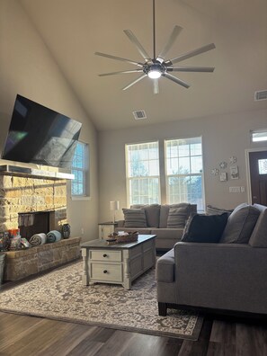TV, fireplace - A Bastrop Escape Where Deer Roam & Families Gather - Sleeps Up to 8 (Bastrop)