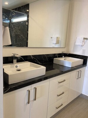 Hair dryer, towels, soap, toilet paper