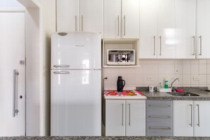 Private kitchen - Penthouse with private barbecue and pool, prime area of ​​Praia Grande. (Ubatuba)