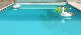 Spacious farmhouse with large garden, swimming pool and river views