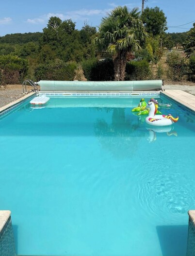 Spacious farmhouse with large garden, swimming pool and river views