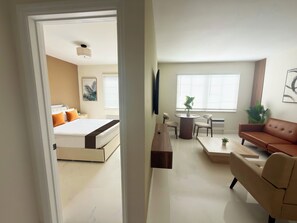 Elite Apartment | Living area | 46-inch Smart TV with cable channels
