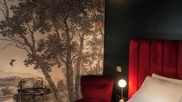 In-room safe, individually decorated, laptop workspace