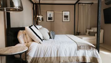 Cubrecamas, colchones con pillow-top y minibar con artículos gratuitos