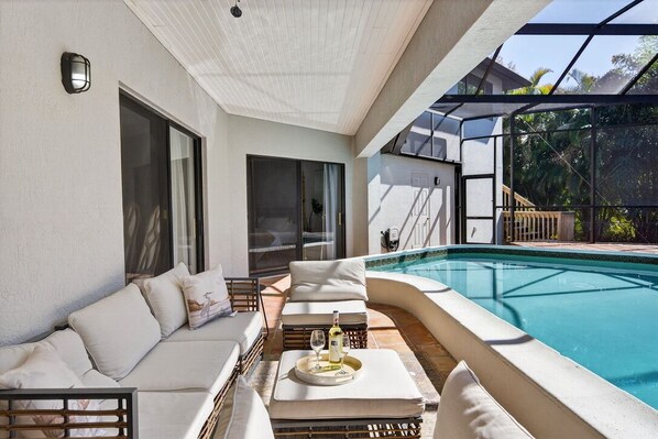 Outdoor pool, a heated pool - Sand & Sea Retreat, Private Heated Pool. Spacious Luxury Home (Sarasota)