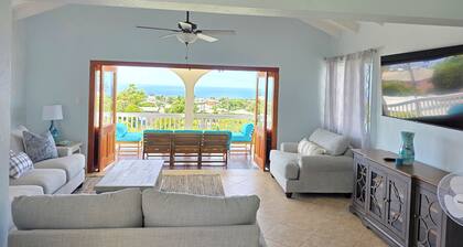 Lovely 3 bed home with bedroom AC in St. James, overlooking the Caribbean Sea