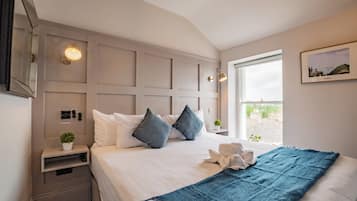 1 dormitorio, tabla de planchar con plancha, Internet y ropa de cama