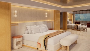 A modern bedroom with a large bed, bedside tables, and a view of another room. - Hotel Londres (Caracas)