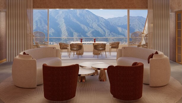 A modern lounge with a panoramic mountain view, featuring a sofa, chairs, and a coffee table. - Hotel Londres (Caracas)