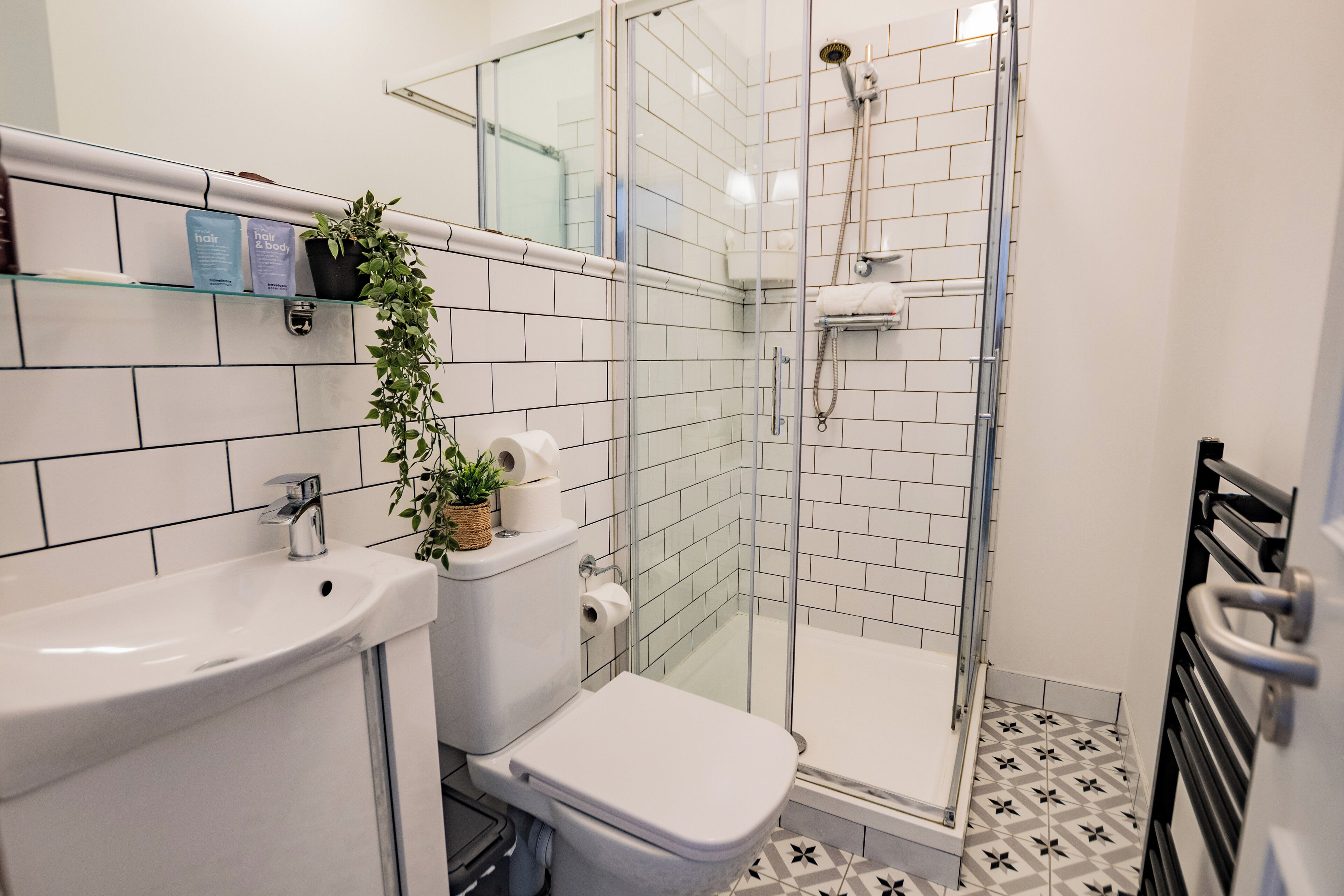 Shower, hair dryer, towels, soap