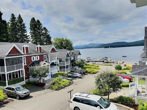 Condo Lac Archambault | Fireplace | beach access