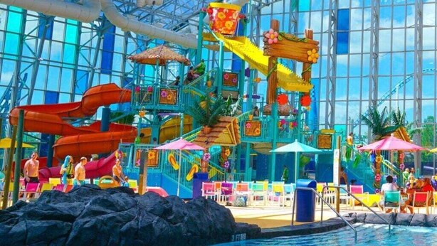 An indoor water park with slides, pools, and play areas. - Resort Feel Home, Private Pool,spa,hammocks. Beach,owa,wharf-15min, 5 Bedrooms (Foley)