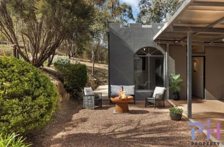 Terrace/patio. The Castle: Off-Grid Retreat nestled in the Sedgwick Valley 20 mins from Bendigo