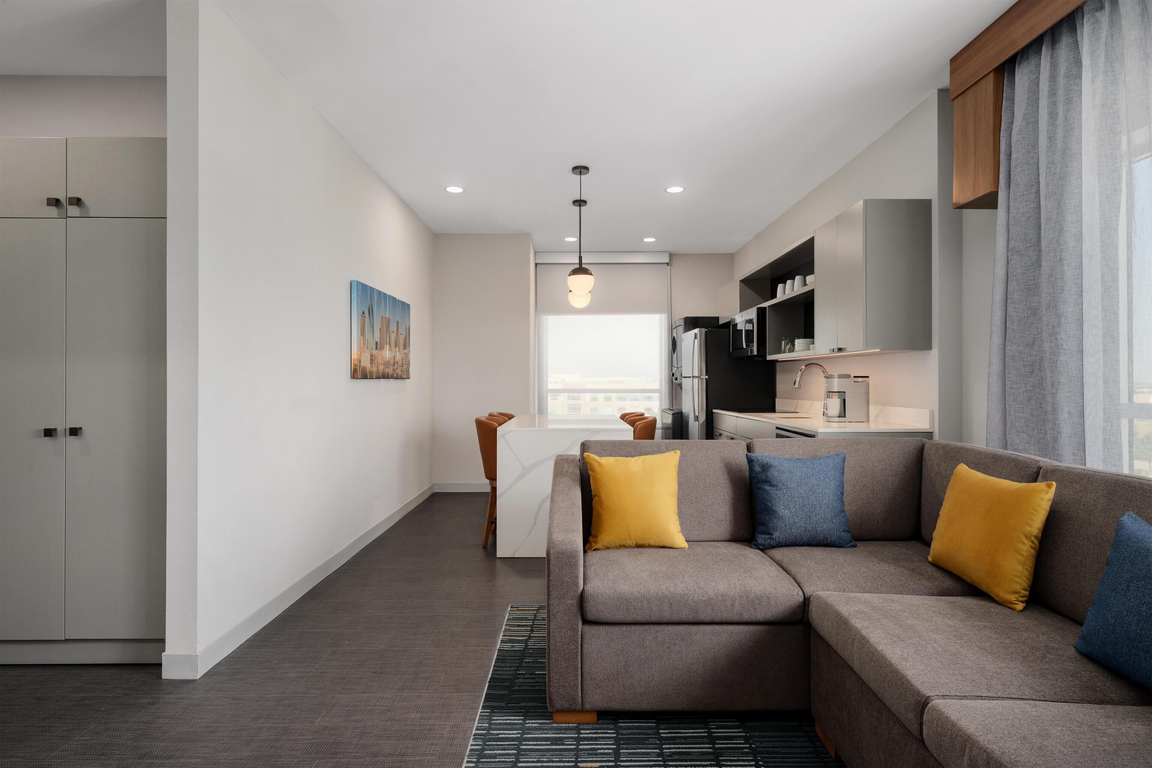 Suite, 1 King Bed (Washer/Dryer) | Living area | TV