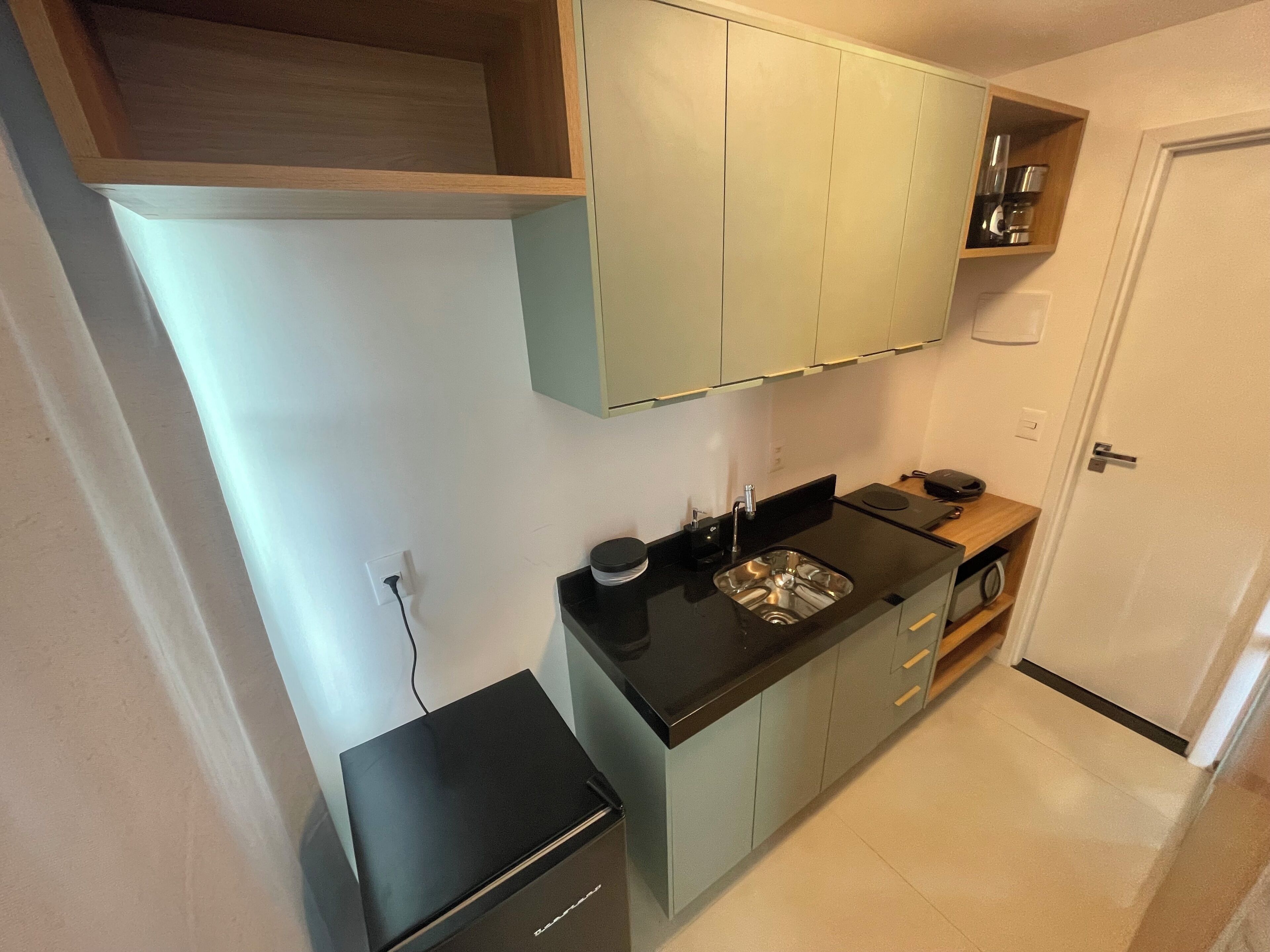 Estúdio luxo, sacada, vista para o mar | Cozinha privada