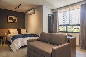 Apartamento standard, 1 cama de casal e sofá-cama | Espaço de trabalho para notebook, Wi-Fi de cortesia