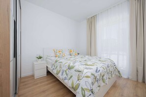 1 slaapkamer, een strijkplank/strijkijzer, wifi, beddengoed