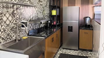 Fridge, microwave, cookware/dishes/utensils
