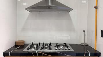 Fridge, microwave, cookware/dishes/utensils