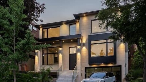 A modern two-story house with a car parked in the driveway. - Mansion Newly Built Custom Design Never Lived In! (Toronto)