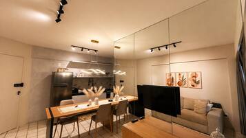 Apartamento família, vista parcial para o mar | Cozinha privada