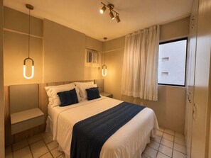 Apartamento família, vista parcial para o mar | Wi-Fi de cortesia