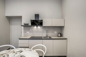 Fridge, microwave, stovetop, dishwasher - Golden Rose - One Bedroom Apartment, Sleeps 5 (Naples)